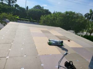 Flat roof replacement/ repairs with insulation in order to create Slope over flat area