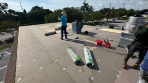 Flat roof replacement/ repairs with insulation in order to create Slope over flat area