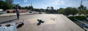 Flat roof replacement/ repairs with insulation in order to create Slope over flat area