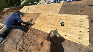 Flat roof replacement/ repairs with insulation in order to create Slope over flat area