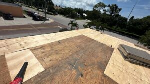 Flat roof replacement/ repairs with insulation in order to create Slope over flat area