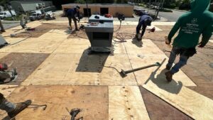 Flat roof replacement/ repairs with insulation in order to create Slope over flat area