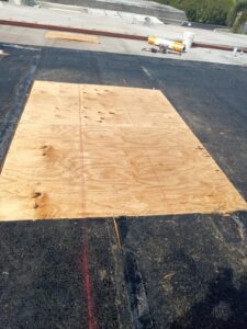 Flat roof replacement with taped insulation in order to create Slope