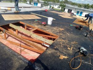 Flat roof replacement with taped insulation in order to create Slope