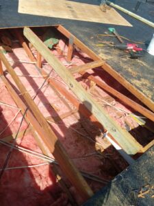 Flat roof replacement with taped insulation in order to create Slope