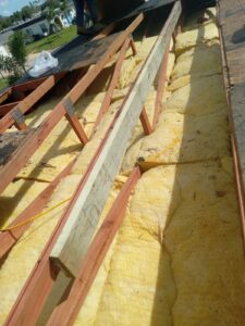 Flat roof replacement with taped insulation in order to create Slope