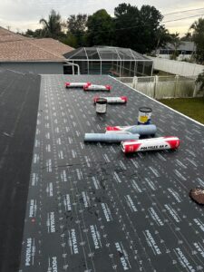 Flat roof replacement with taped insulation in order to create Slope