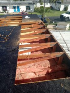 Flat roof replacement with taped insulation in order to create Slope