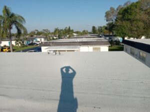 Flat roof replacement with taped insulation in order to create Slope