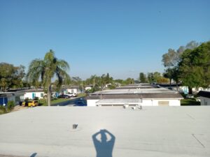 Flat roof replacement with taped insulation in order to create Slope