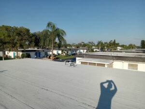 Flat roof replacement with taped insulation in order to create Slope