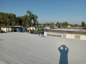Flat roof replacement with taped insulation in order to create Slope