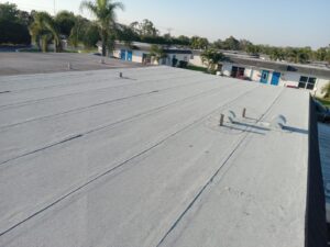 Flat roof replacement with taped insulation in order to create Slope