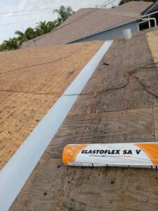 Flat roof replacement with taped insulation in order to create Slope