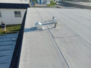 Flat roof replacement with taped insulation in order to create Slope