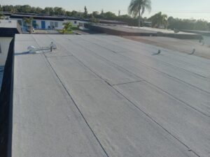 Flat roof replacement with taped insulation in order to create Slope