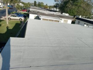 Flat roof replacement with taped insulation in order to create Slope