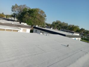 Flat roof replacement with taped insulation in order to create Slope