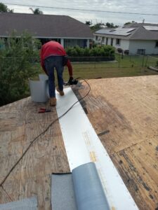 Flat roof replacement with taped insulation in order to create Slope