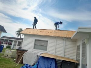 Flat roof replacement with taped insulation in order to create Slope