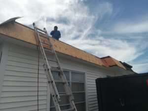 Flat roof replacement with taped insulation in order to create Slope